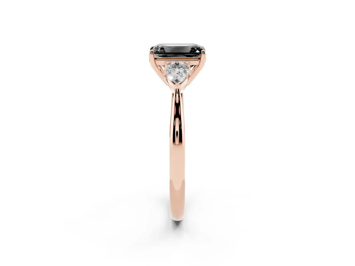 Fancy Black Three-Stone Emerald Cut Brilliant Diamond Solitaire Ring with Tapered Band and Four-Prong Setting Rose gold