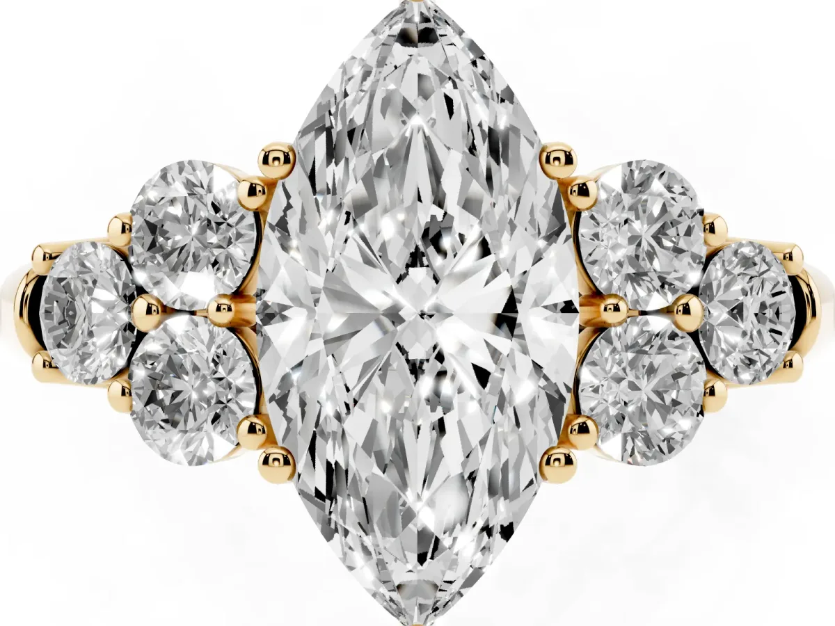 Marquise Cut Cut Diamond Cluster Ring with Round Accent Stones and Prong Setting on a Classic Band Yellow gold