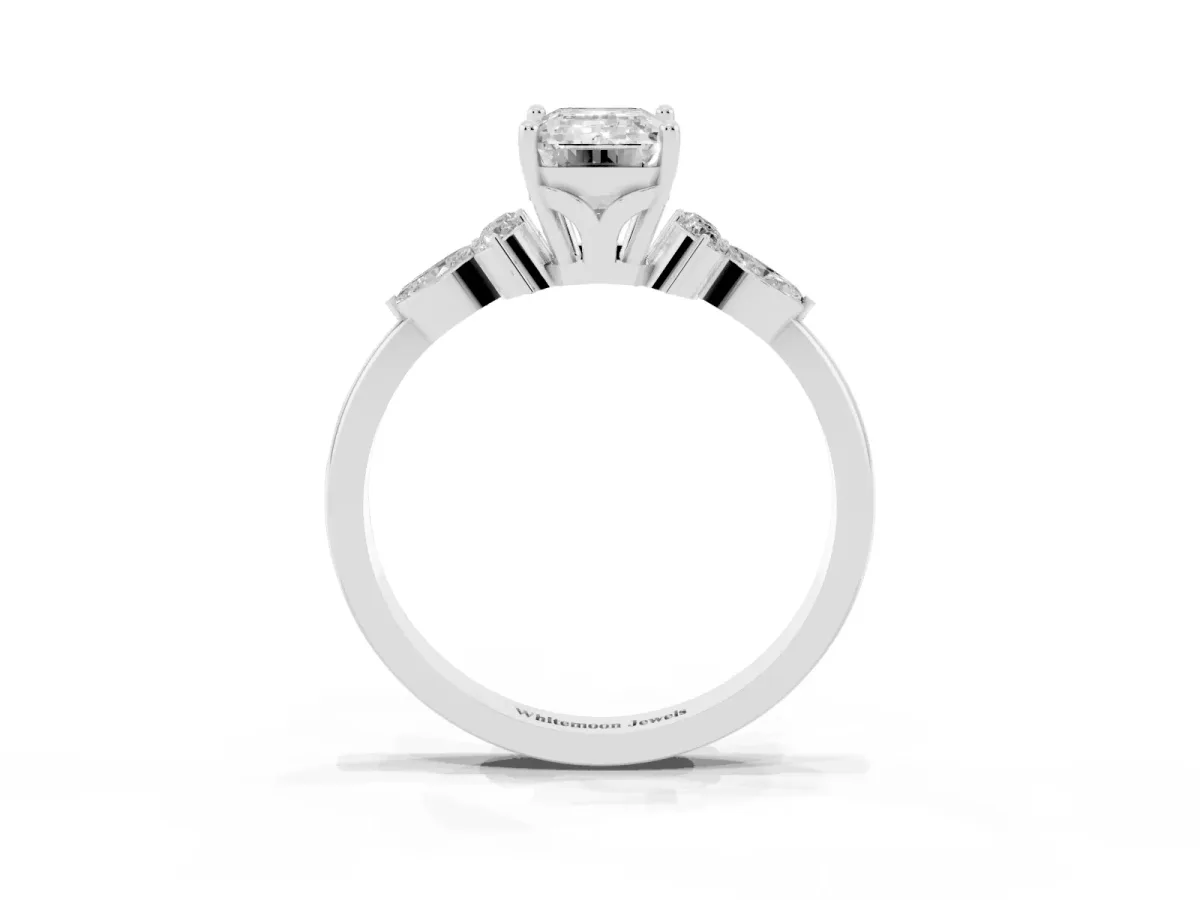 Emerald Cut Brilliant Diamond Solitaire Ring with Pear Side Stones and Four-Prong Setting Silver