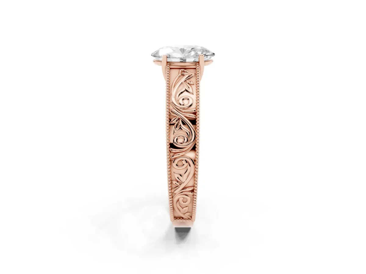 Oval Cut Diamond Solitaire Ring with Engraved Band and Four-Prong Setting Rose gold