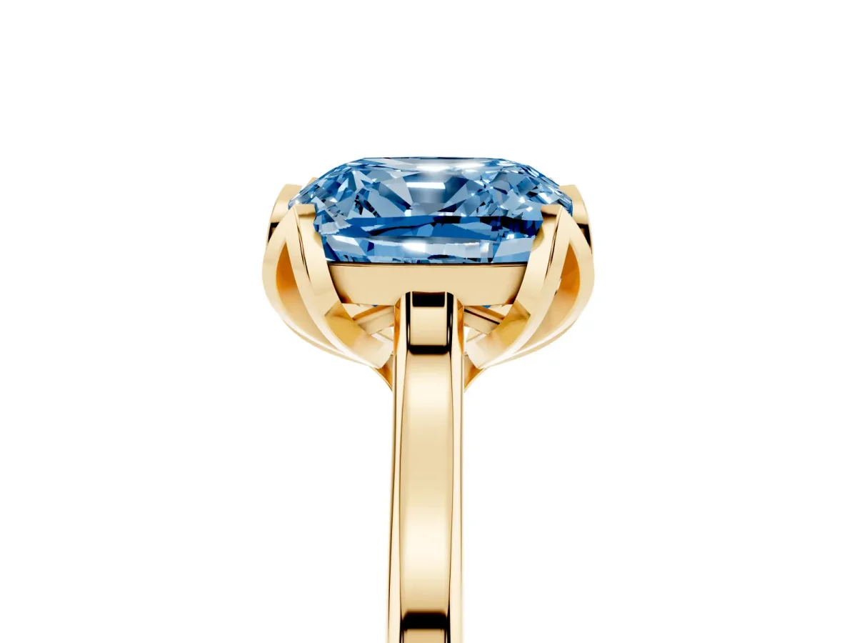 Fancy Blue Cushion Cut Diamond Solitaire Ring with Flower Prong Setting and Classic Band Yellow gold