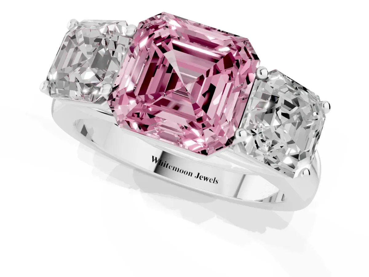 Fancy Pink Asscher Cut Three-Stone Diamond Ring with Prong Setting on a Classic Band Platinum