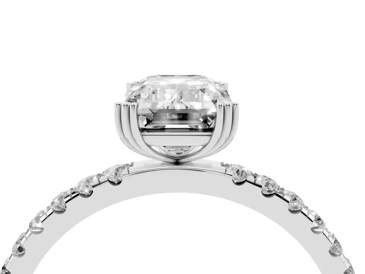 Emerald Cut Brilliant Solitaire with Pavé Band and Claw Prong Setting Silver
