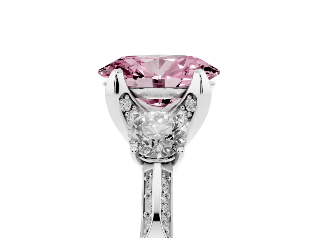 Fancy Pink Oval Cut Brilliant Three-Stone Diamond Ring with Pavé Band and Four-Prong Setting Platinum