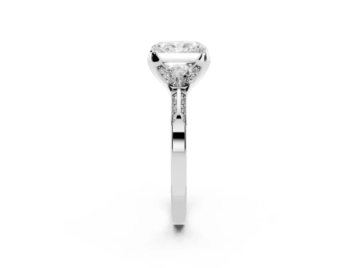 Radiant Cut Brilliant Three-Stone Diamond Ring with Pavé Band and Four-Prong Setting White gold