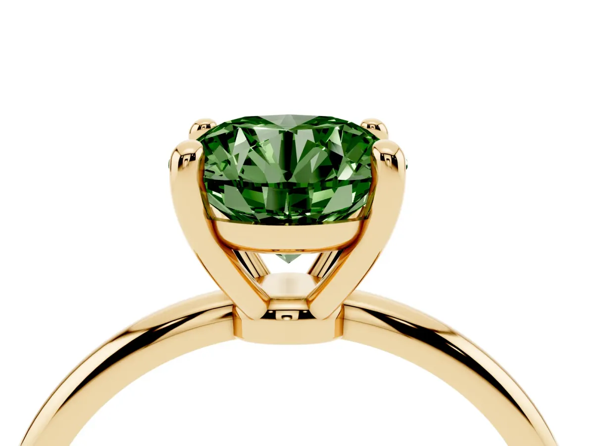 Fancy Green Round Cut Solitaire Diamond Ring with 4-Prong Setting on a Classic Band Yellow gold