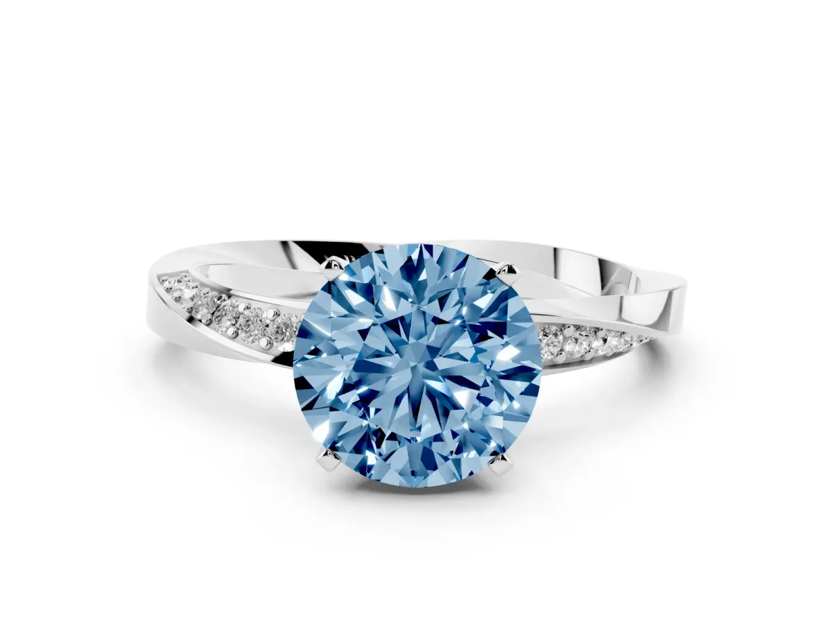 Fancy Blue Round Cut Diamond Engagement Ring with Side Stone Accents and Four-Prong Setting Silver