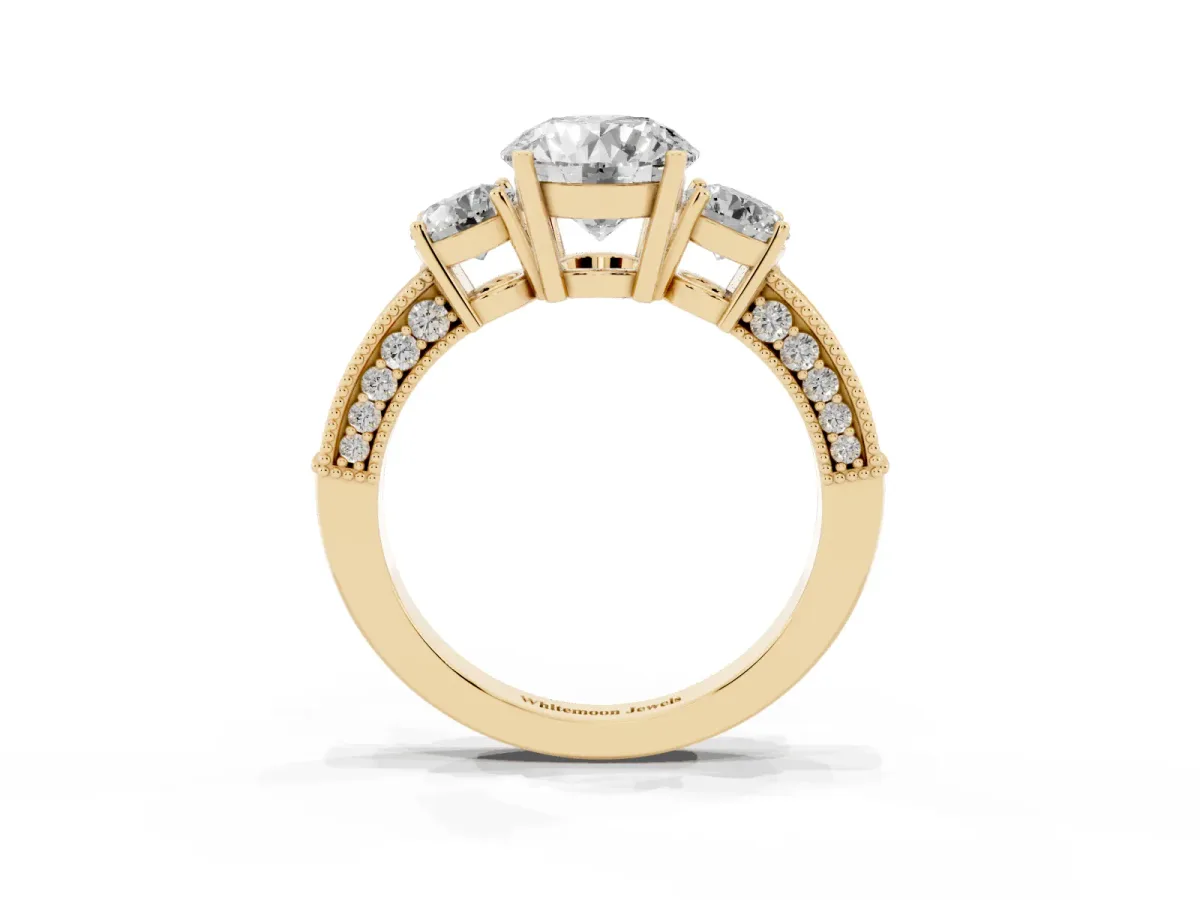 Round Cut Three-Stone Diamond Ring with Pavé Band and Four-Prong Setting Yellow gold