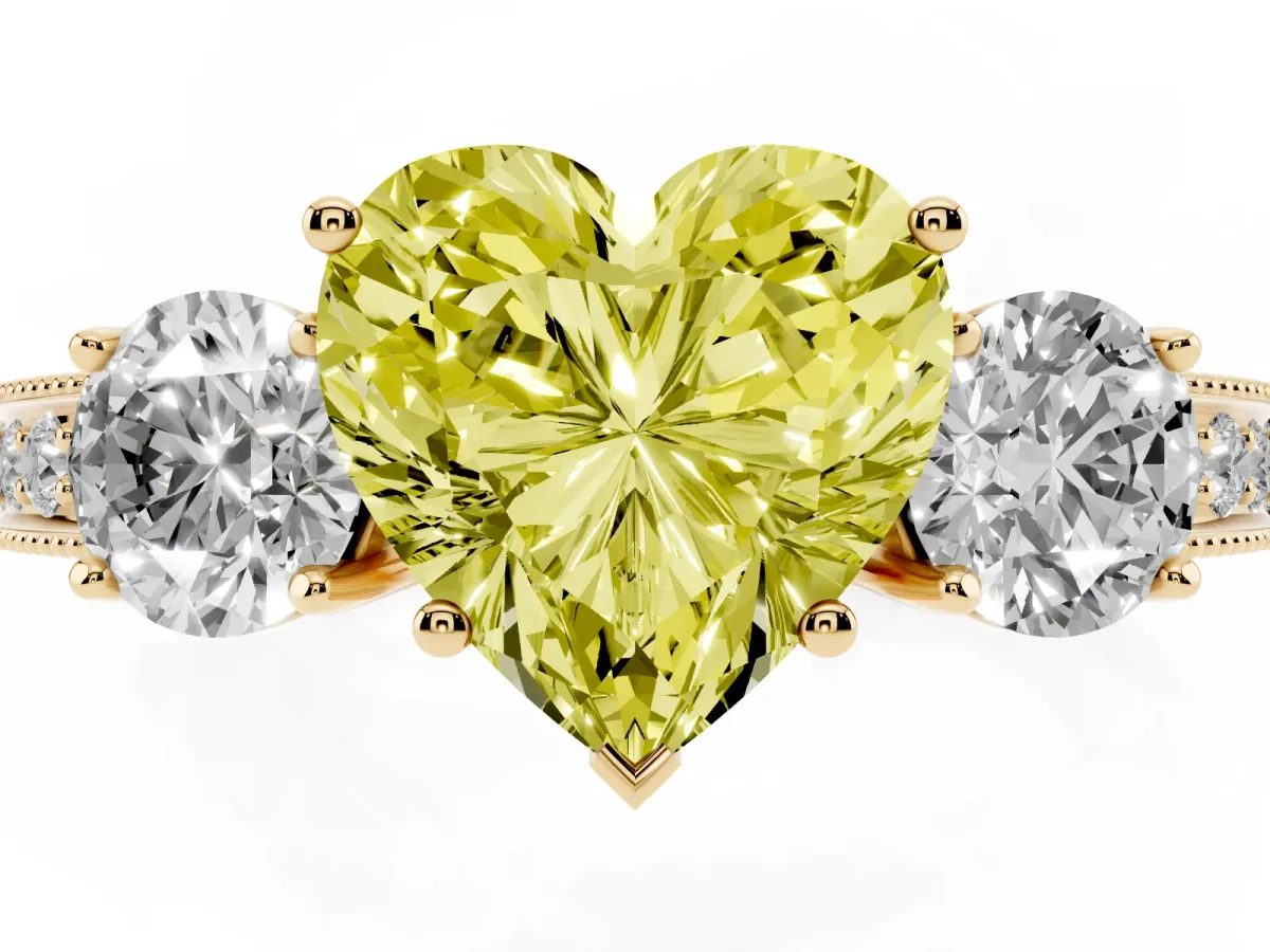 Fancy Yellow Heart Cut Three-Stone Diamond Ring with Pavé Band and Four-Prong Setting Yellow gold