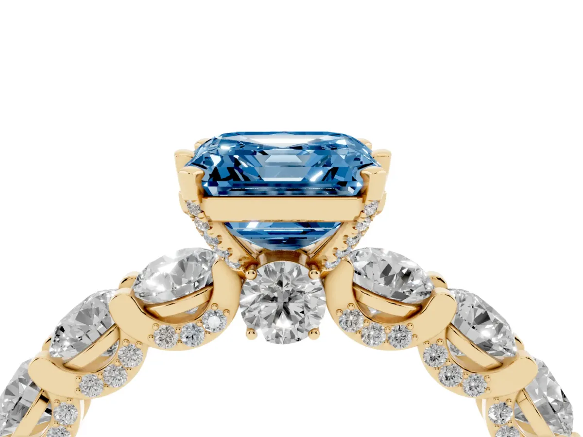 Fancy Blue Asscher Cut Diamond Side Stone Engagement Ring with Four-Prong Setting Yellow gold