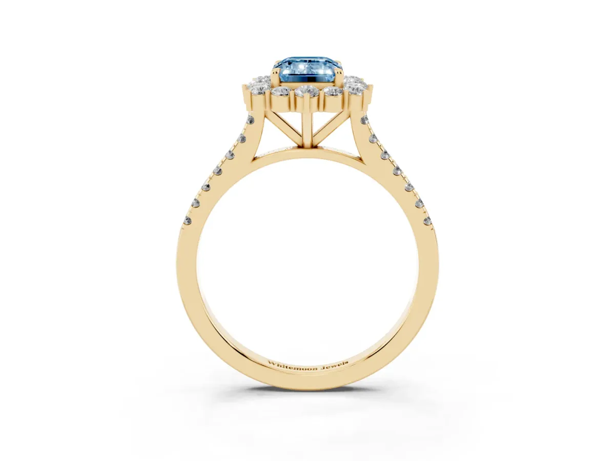 Fancy Blue Emerald Cut Halo Diamond Ring with Pavé Band and Prong Setting Yellow gold