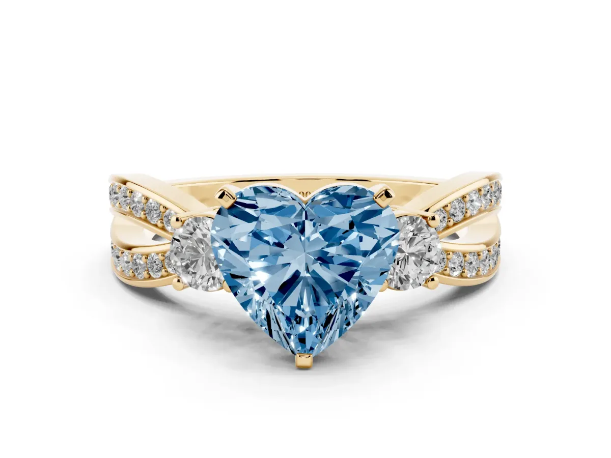 Fancy Blue Three-Stone Heart Cut Cut Diamond Twist Band with Prong Setting Yellow gold