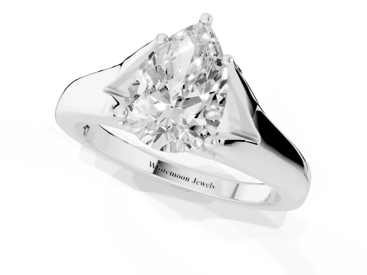 Pear Cut Solitaire Diamond Ring with Cathedral Band and Four-Prong Setting Platinum
