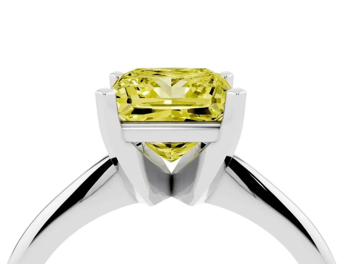 Fancy Yellow Princess Cut Cut Solitaire Ring with Four-Prong Setting on a Classic Band Silver