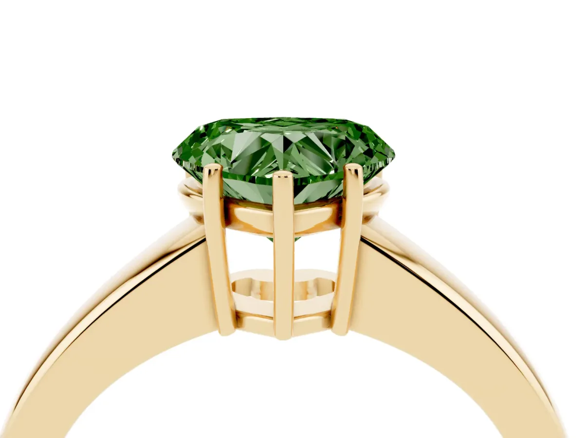 Fancy Green Heart Cut Solitaire Diamond Ring with Tapered Band and Four-Prong Setting Yellow gold