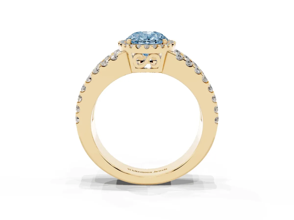 Fancy Blue Oval Cut Cut Halo Split Shank Diamond Ring with Four-Prong Setting Yellow gold