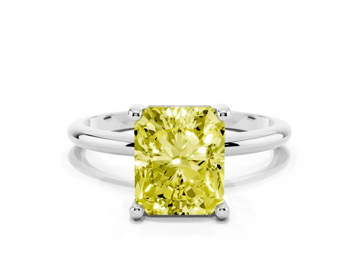 Fancy Yellow Radiant Cut Solitaire Diamond Ring with 4-Prong Setting on a Classic Band Platinum