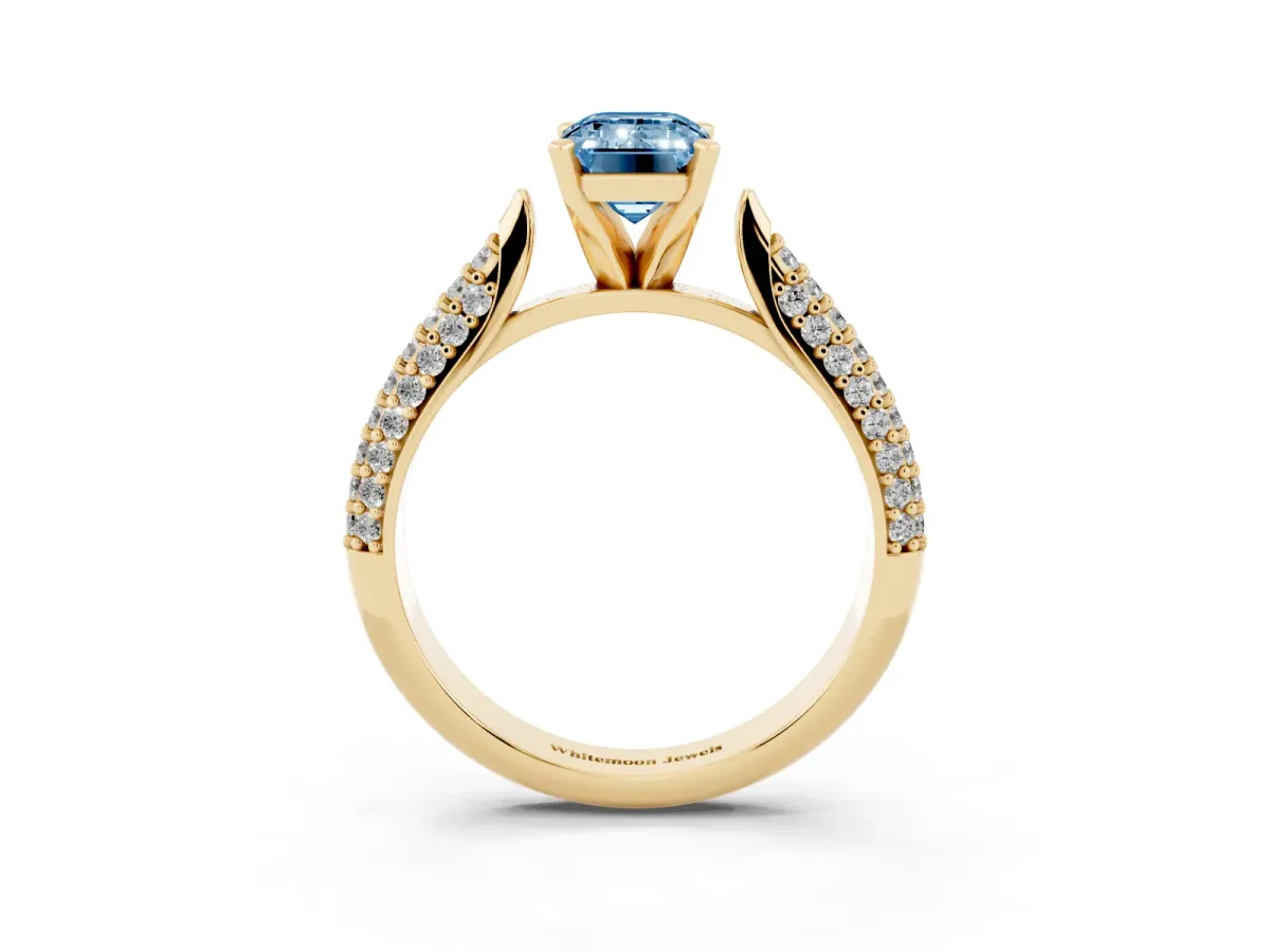 Fancy Blue Emerald Cut Diamond Solitaire Engagement Ring with Multi-Row Round Pavé Band and Prong Setting Yellow gold