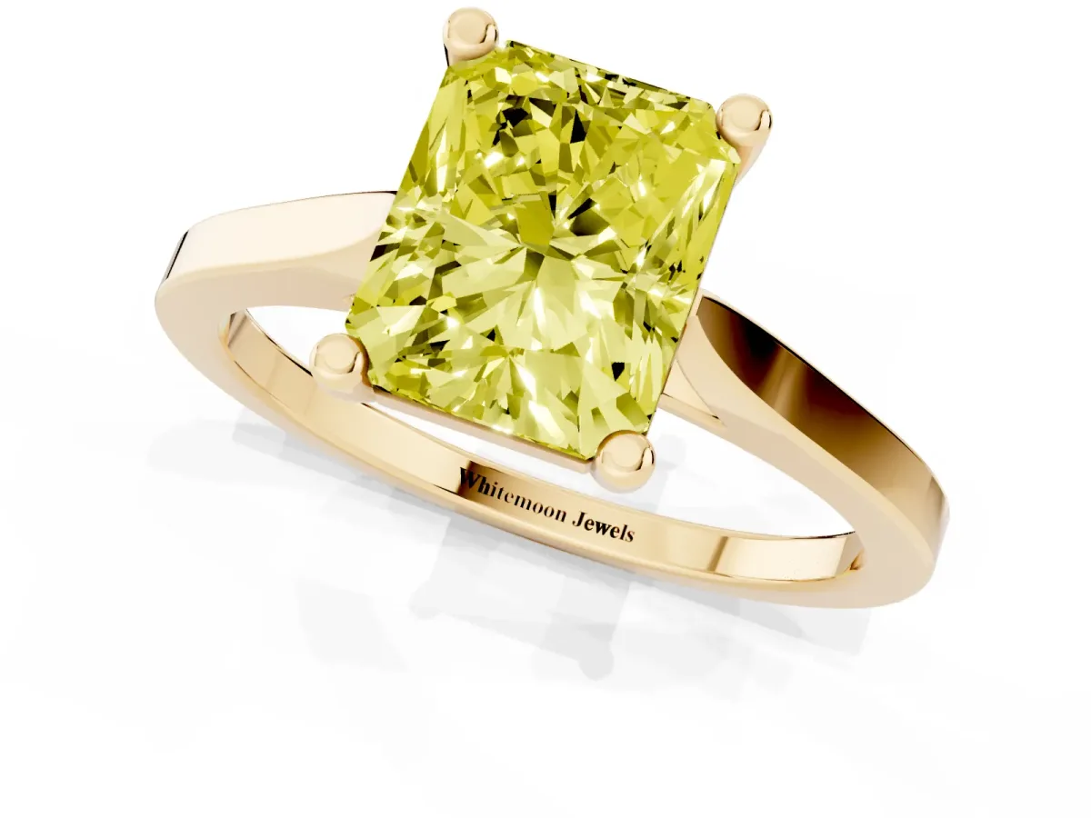 Fancy Yellow Radiant Cut Solitaire Diamond Ring with Four-Prong Setting and Tapered Band Yellow gold