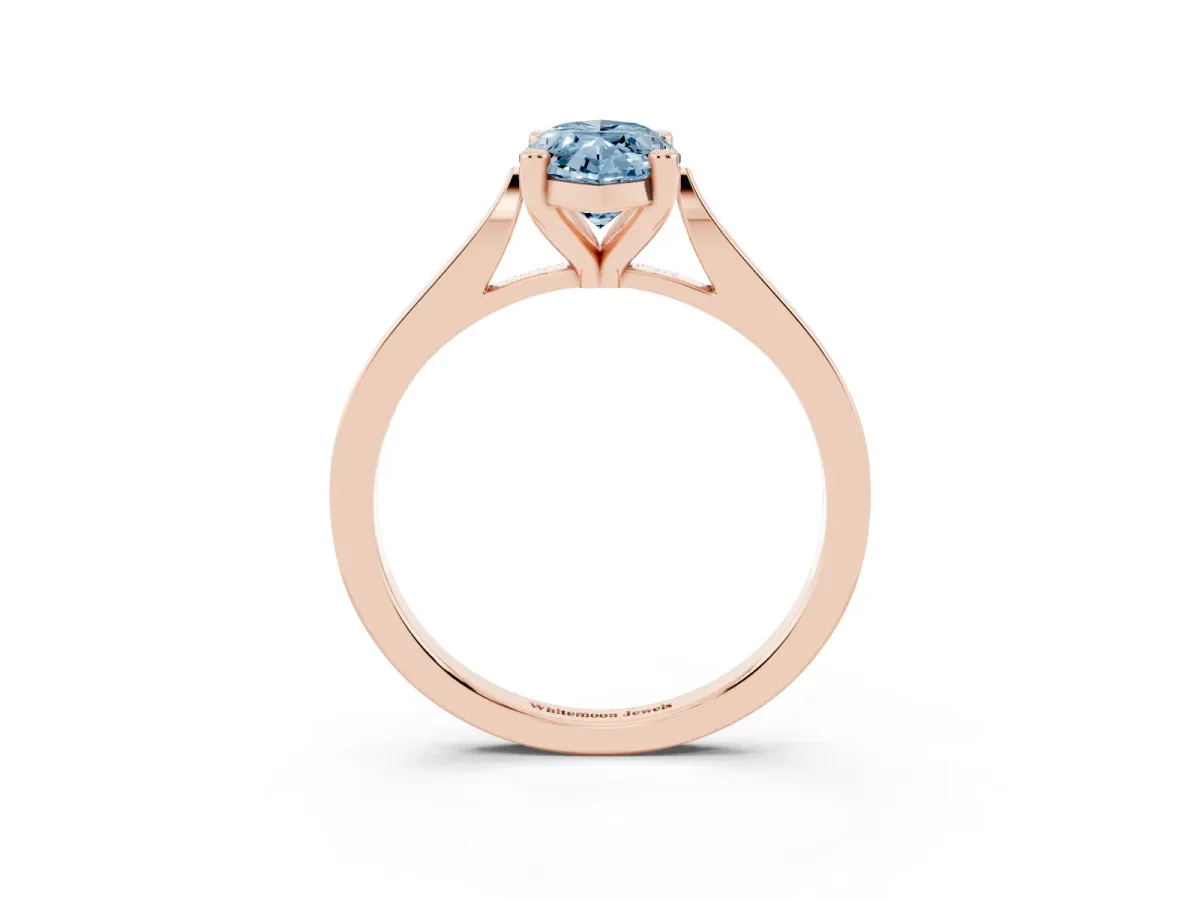 Fancy Blue Marquise Cut Solitaire Diamond Ring with Four-Prong Setting and Tapered Band Rose gold