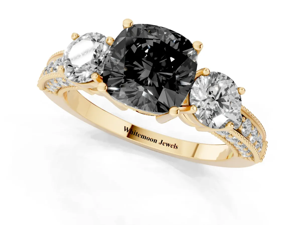 Fancy Black Cushion Cut Three-Stone Diamond Ring with Pavé Band and Four-Prong Setting Yellow gold