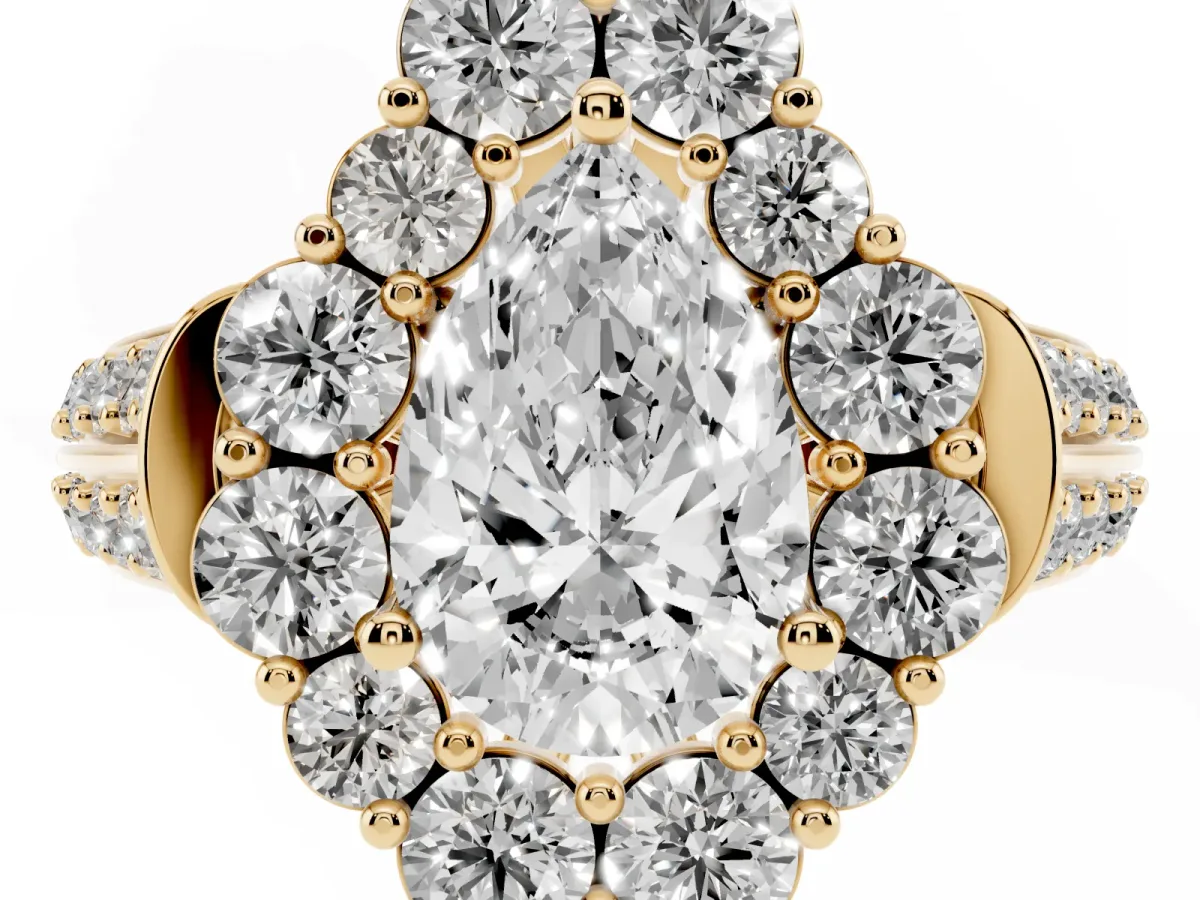 Pear Cut Halo Diamond Engagement Ring with Split Shank and Prong Setting Yellow gold