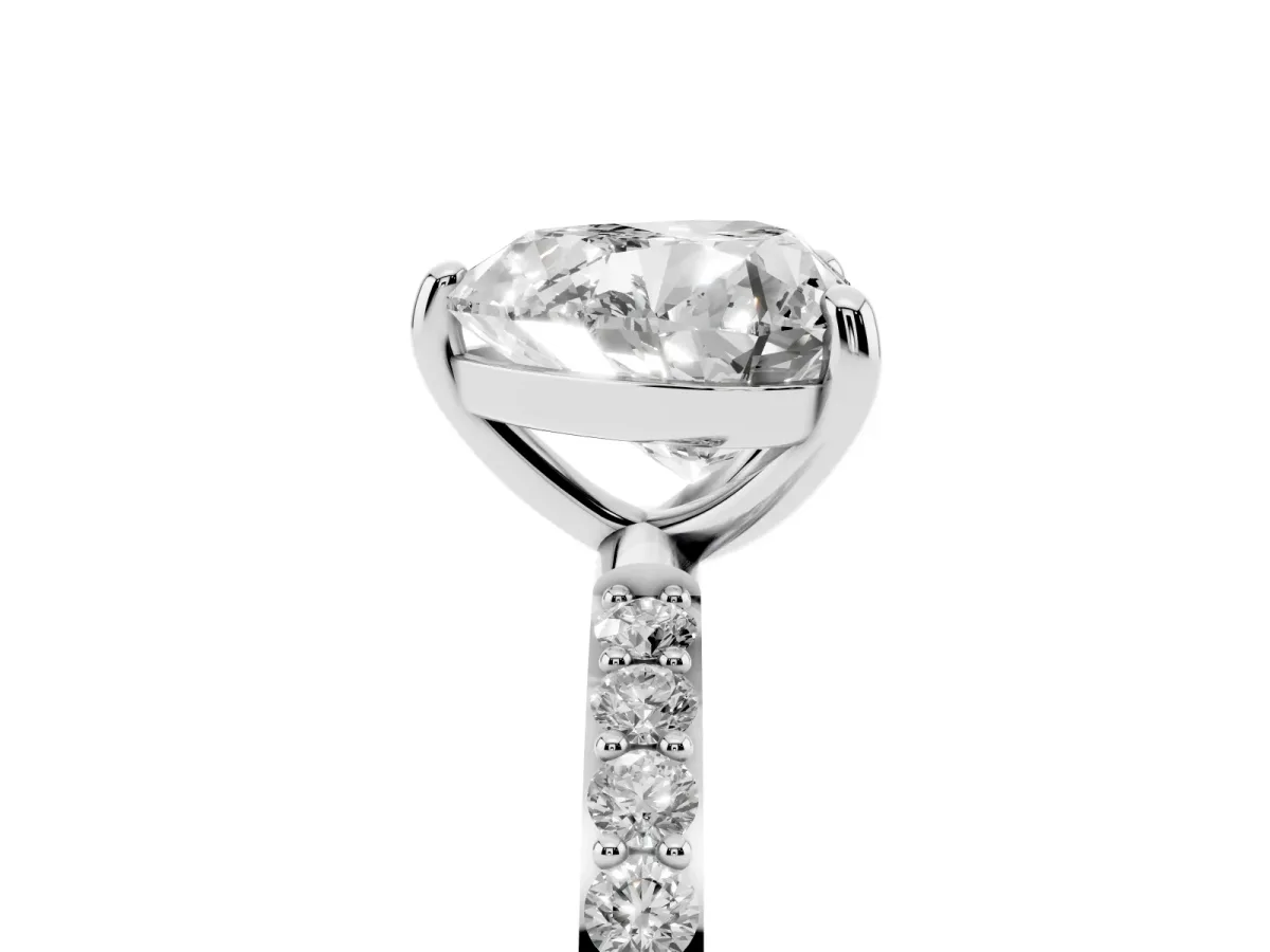 Heart Cut Diamond Solitaire Ring with Round Pavé Band and Prong Setting Silver