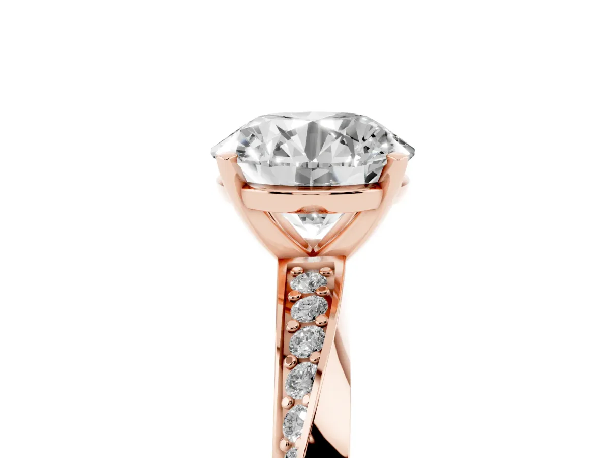 Round Cut Diamond Engagement Ring with Side Stone Accents and Four-Prong Setting Rose gold