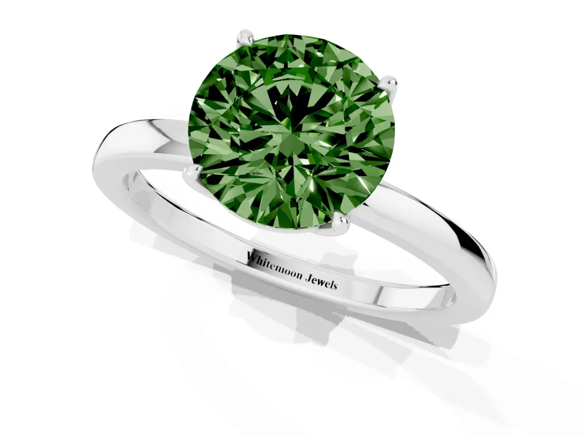 Fancy Green Round Cut Diamond Solitaire Ring with Thin Band and Prong Setting Platinum