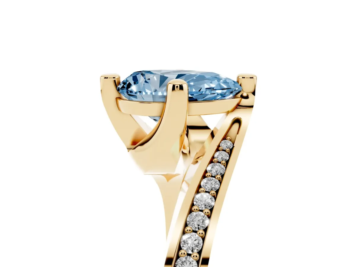 Fancy Blue Pear Cut Solitaire Diamond Twist Band with Pavé Setting and Four-Prong Setting Yellow gold