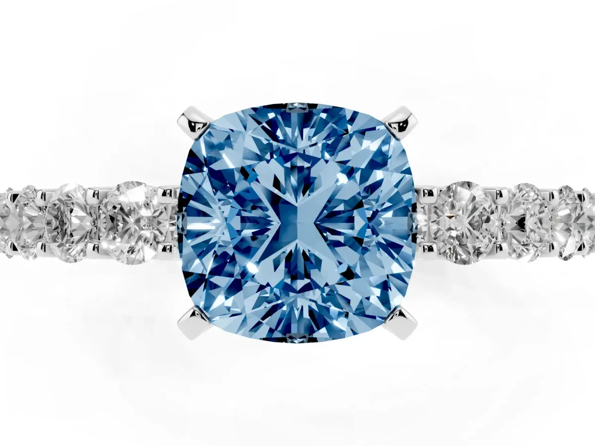 Fancy Blue Cushion Cut Diamond Solitaire Ring with Shared Prong Pavé Band and Four-Prong Setting Silver