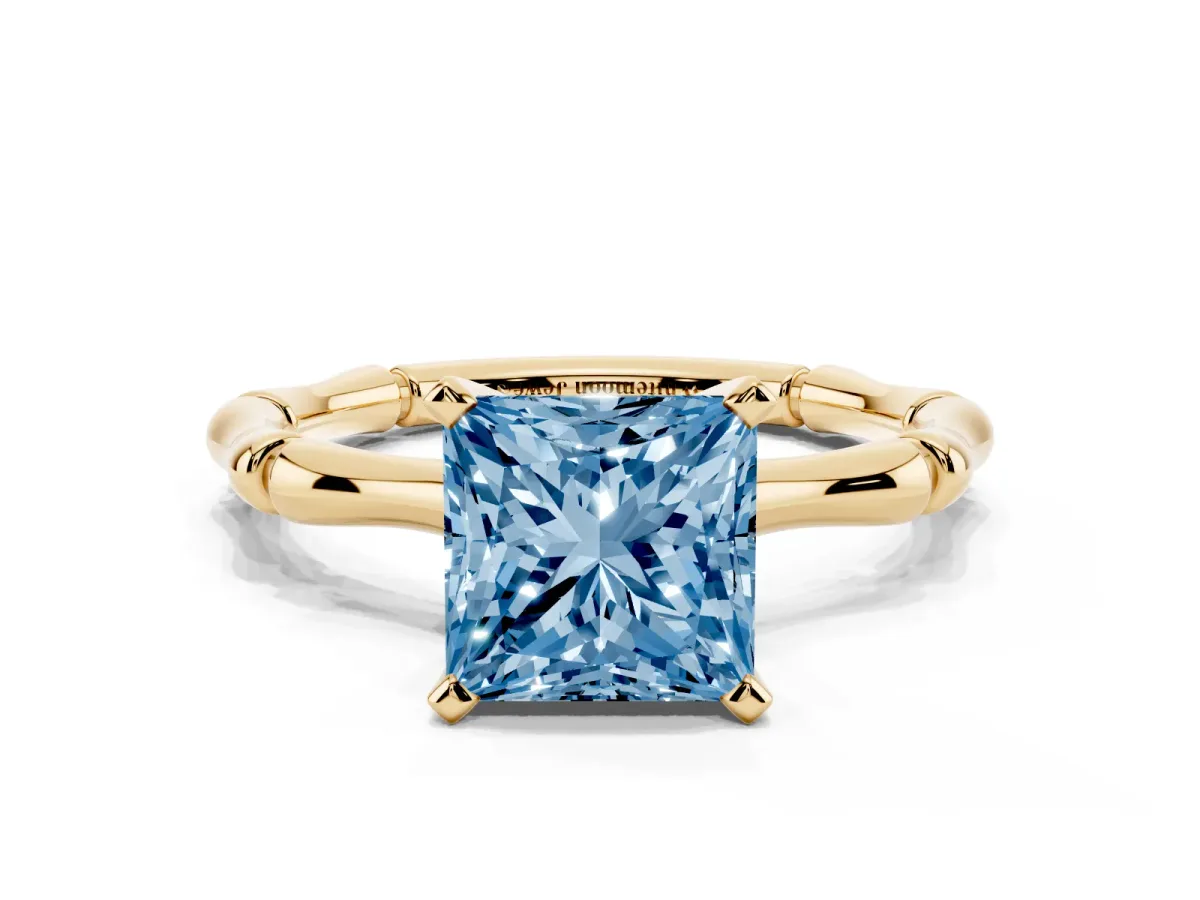 Fancy Blue Princess Cut Solitaire Diamond Ring with Bamboo Band and Four-Prong Setting Yellow gold