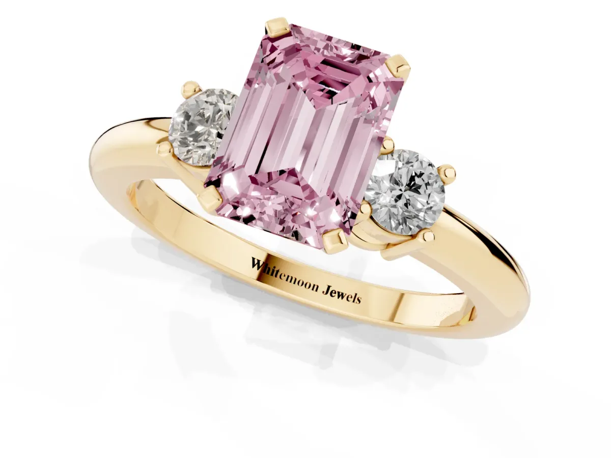 Fancy Pink Three-Stone Emerald Cut Cut Diamond Solitaire with Prong Setting and Classic Band Yellow gold