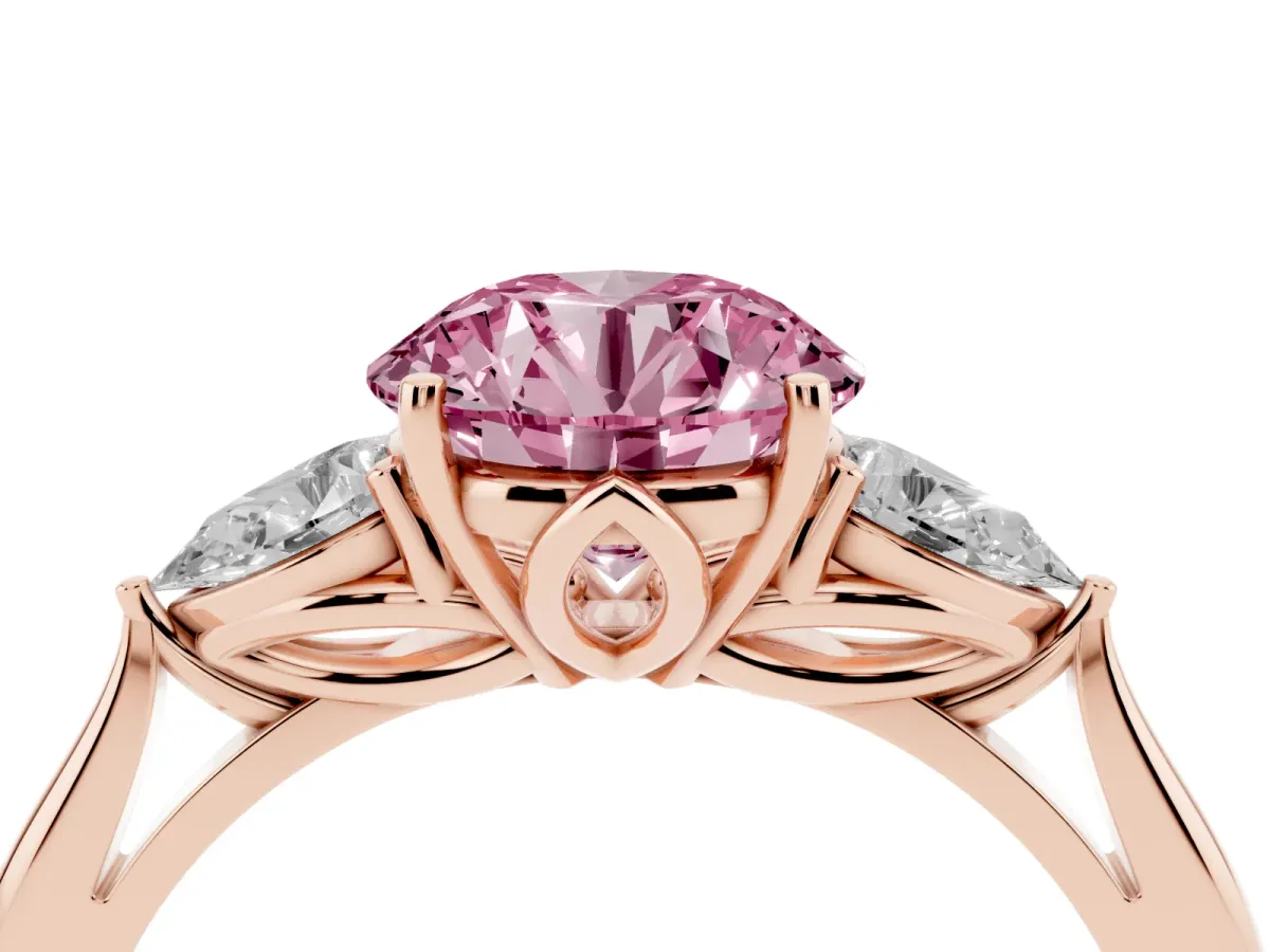 Fancy Pink Round Cut Diamond Three-Stone Ring with Pear Side Stones and Prong Setting Rose gold