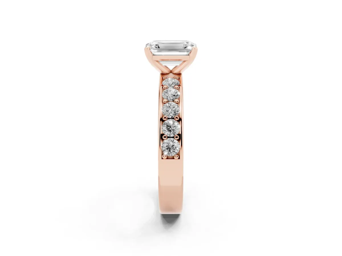 Emerald Cut Diamond Engagement Ring with Channel Set Round Band and Prong Setting Rose gold