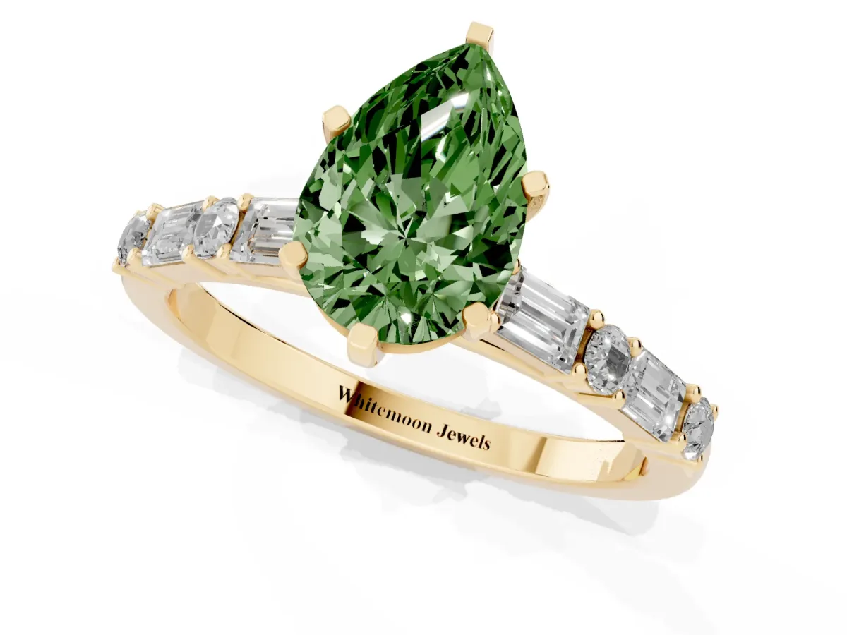 Fancy Green Pear Cut Diamond Solitaire with Side Baguettes and Channel Set Band Yellow gold