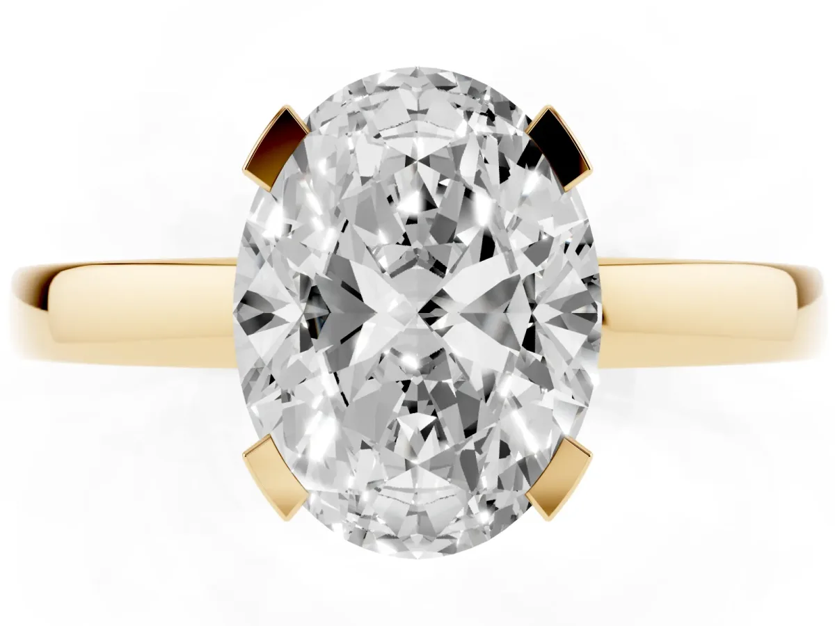 Oval Cut Cut Solitaire Ring with Four-Prong Setting and Classic Band Yellow gold