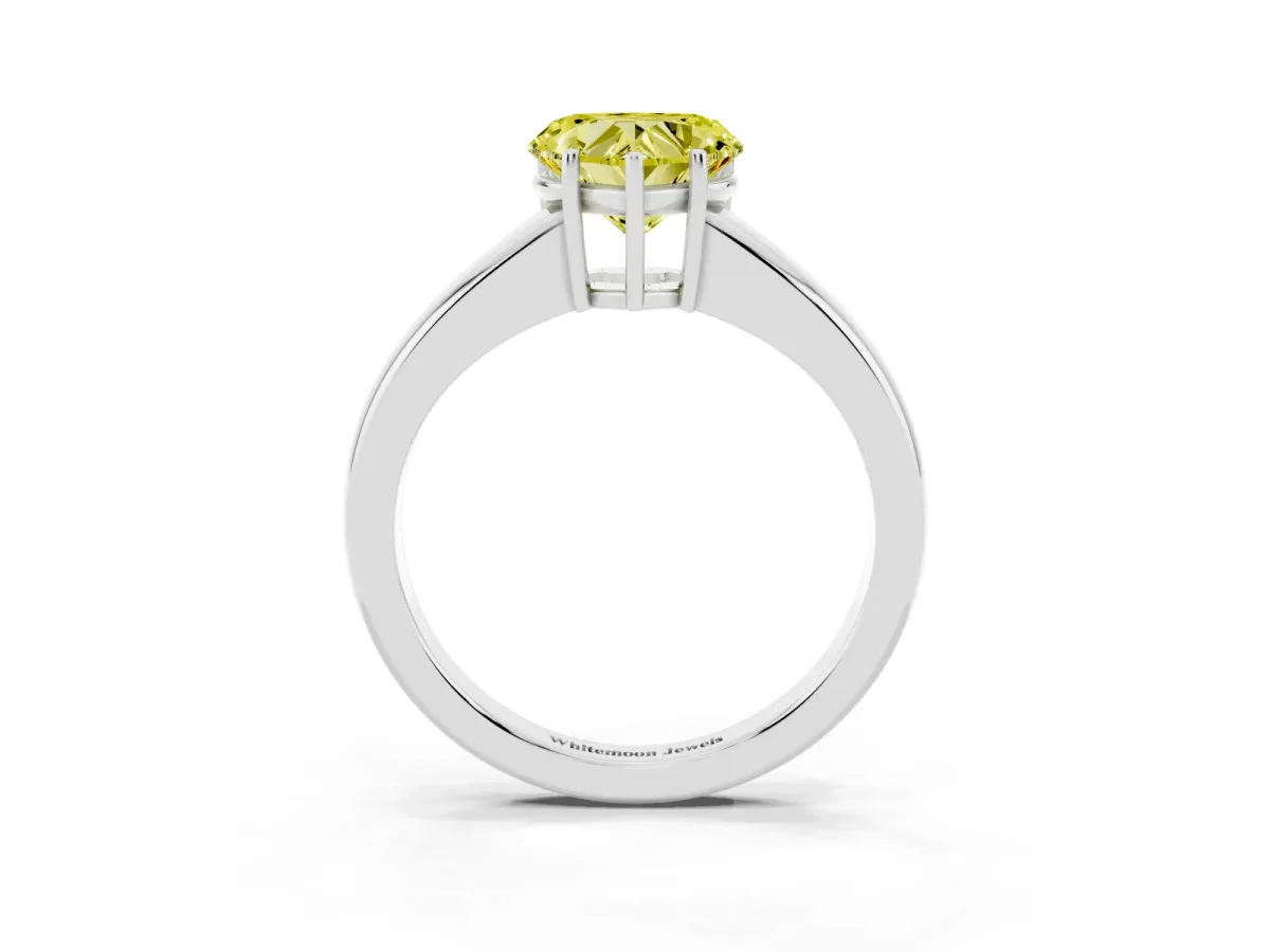 Fancy Yellow Heart Cut Solitaire Diamond Ring with Tapered Band and Four-Prong Setting Silver