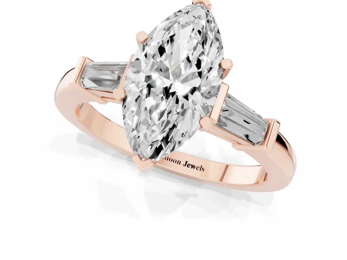 Marquise Cut Cut Diamond Solitaire Ring with Tapered Baguette Accents and Four-Prong Setting Rose gold