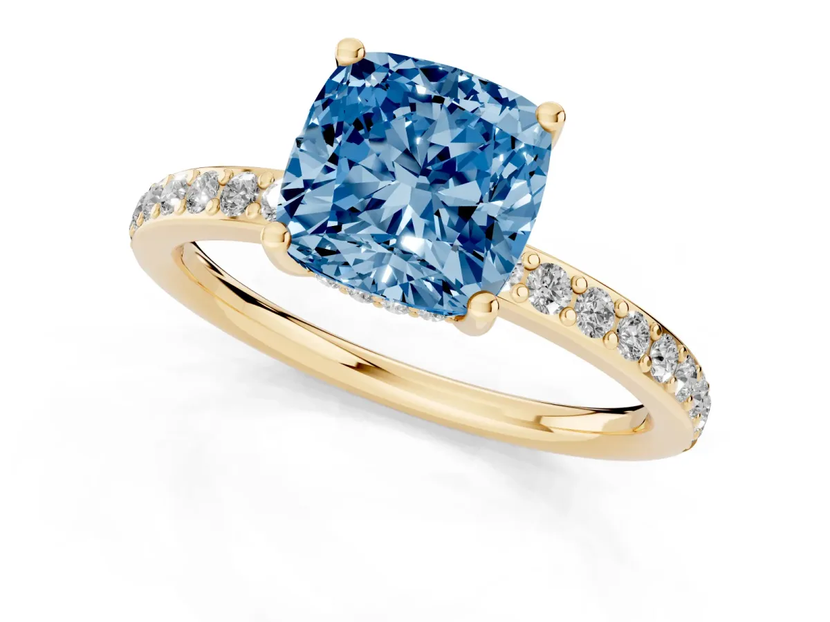 Fancy Blue Cushion Cut Cut Diamond Pavé Band Ring with Four-Prong Setting Yellow gold