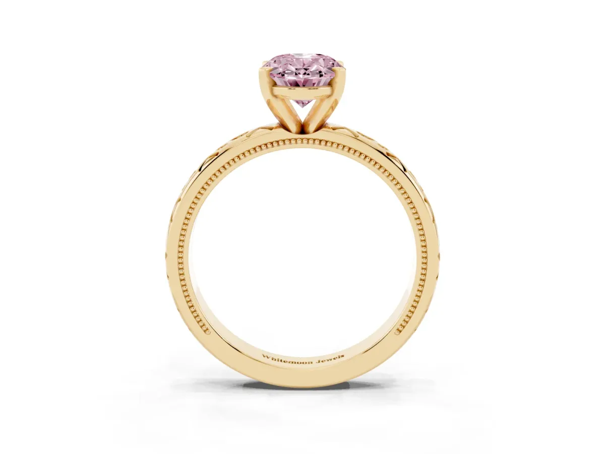Fancy Pink Oval Cut Solitaire Engagement Ring with Scrollwork Band and Four-Prong Setting Yellow gold