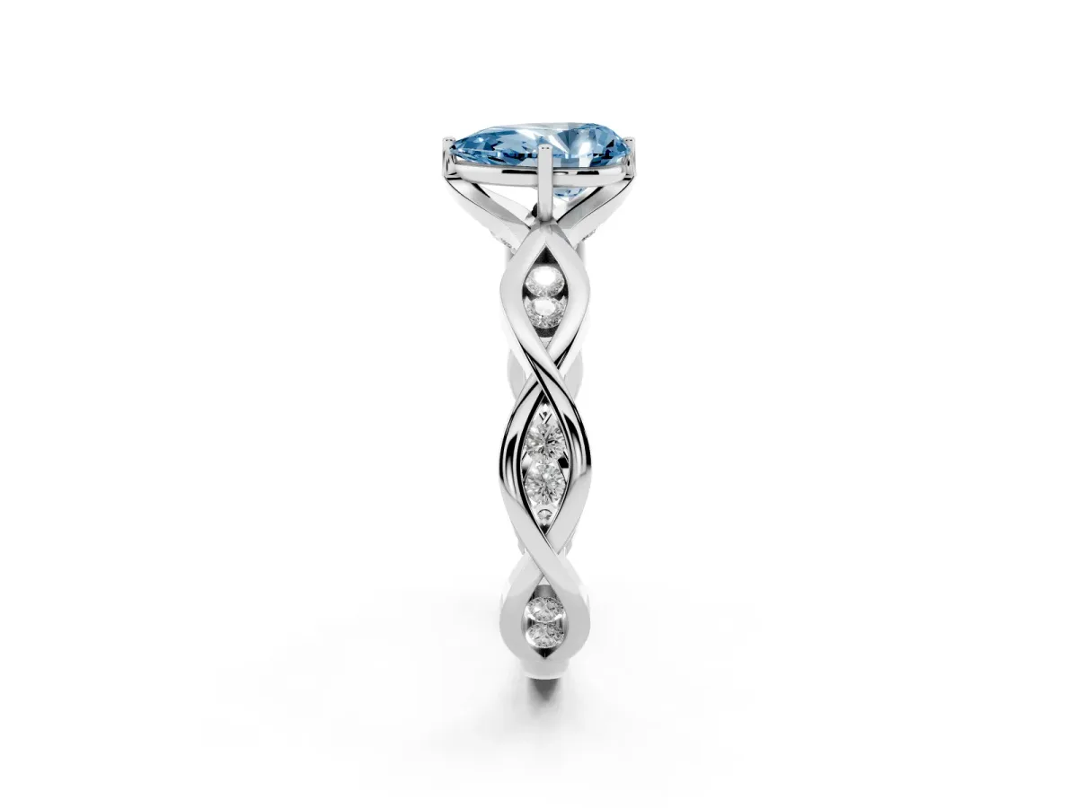 Fancy Blue Pear Cut Solitaire Twist Band with Leaf Prong Setting Silver