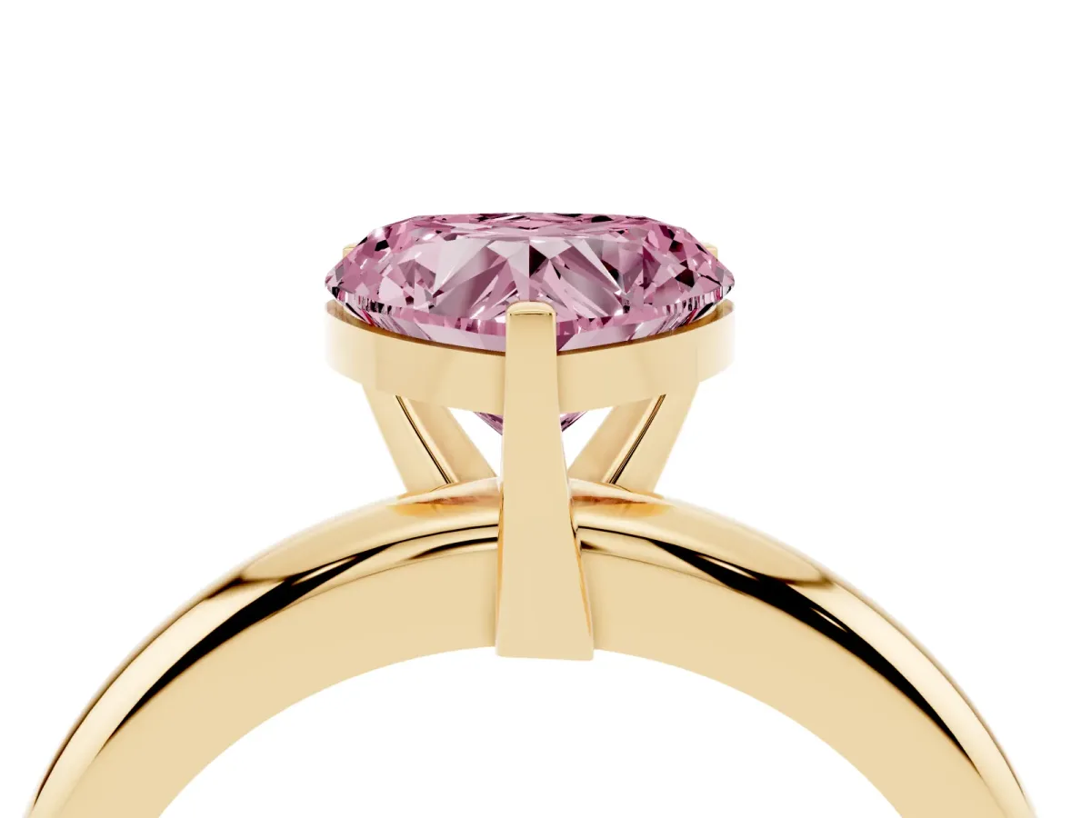 Fancy Pink Heart Cut Diamond Solitaire Engagement Ring with Round Band and Four-Prong Setting Yellow gold