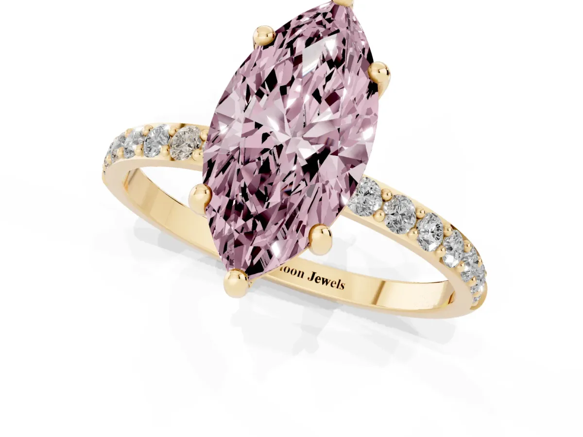 Fancy Pink Marquise Cut Diamond Solitaire Ring with Round Pavé Band and Prong Setting Yellow gold