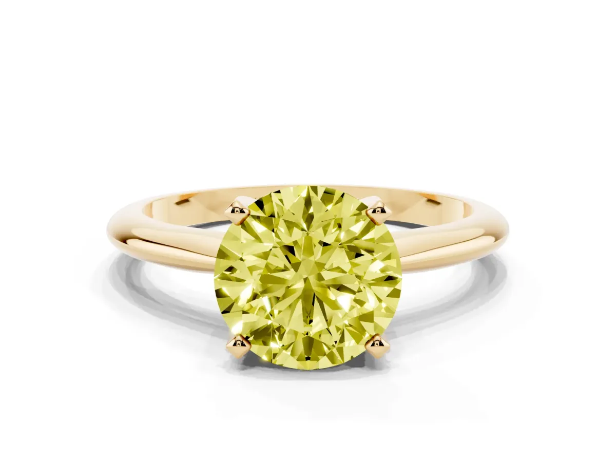 Fancy Yellow Round Cut Cut Solitaire Ring with Four-Prong Setting on a Classic Band Yellow gold