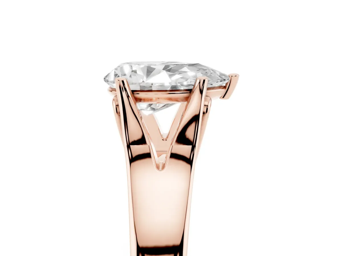 Pear Cut Solitaire Diamond Ring with Cathedral Band and Four-Prong Setting Rose gold