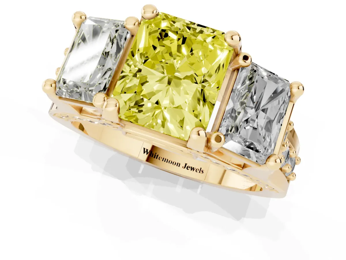 Fancy Yellow Radiant Cut Diamond Three-Stone Ring with Channel Set Band and Four-Prong Setting Yellow gold