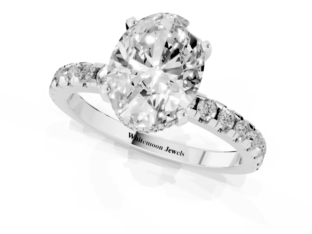 Oval Cut Diamond Solitaire Ring with Round Pavé Band and Four-Prong Setting Silver