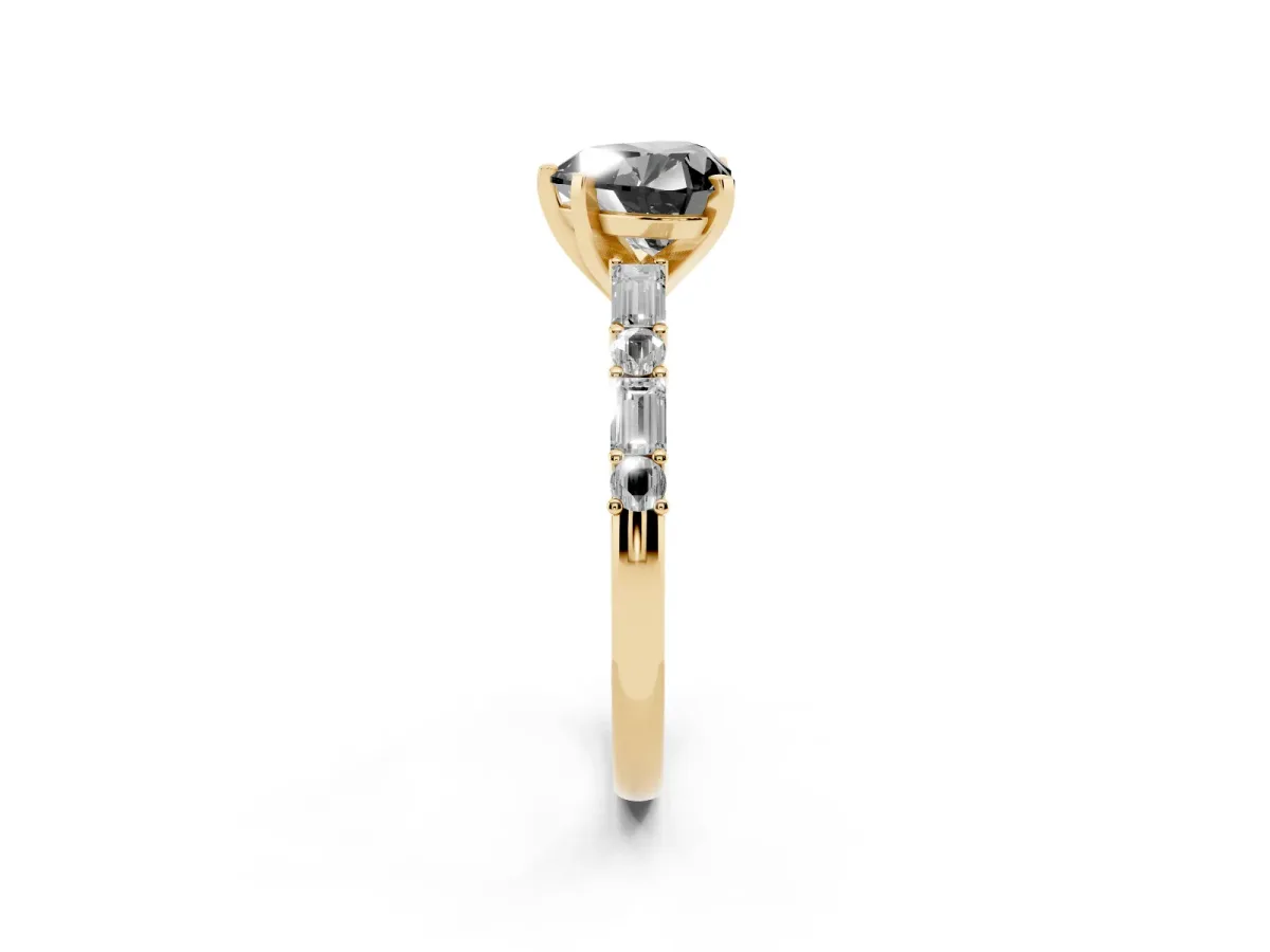Fancy Black Heart Cut Diamond Solitaire with Side Baguettes and Channel Set Band Yellow gold