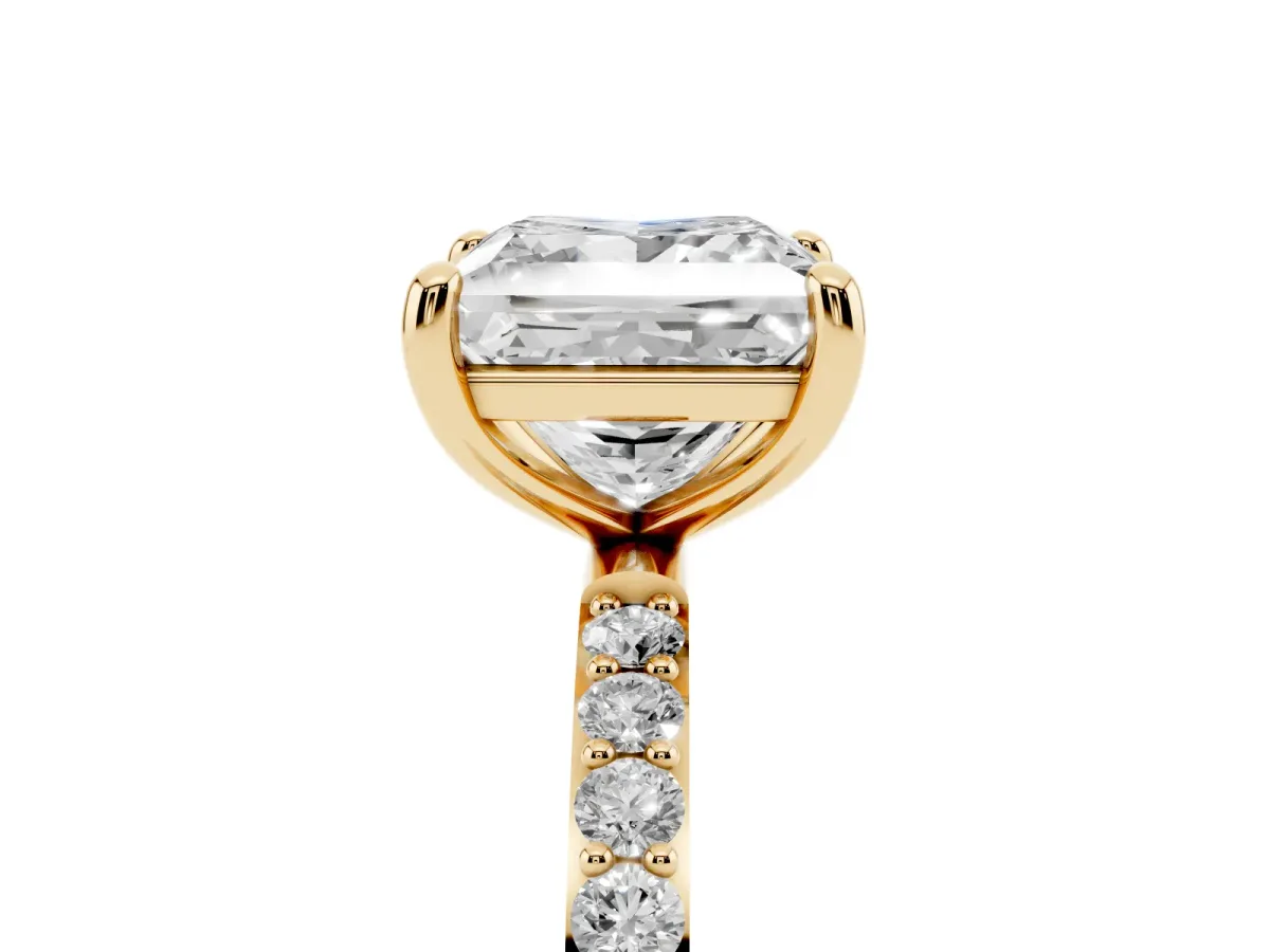 Princess Cut Diamond Solitaire Ring with Round Pavé Band and Prong Setting Yellow gold